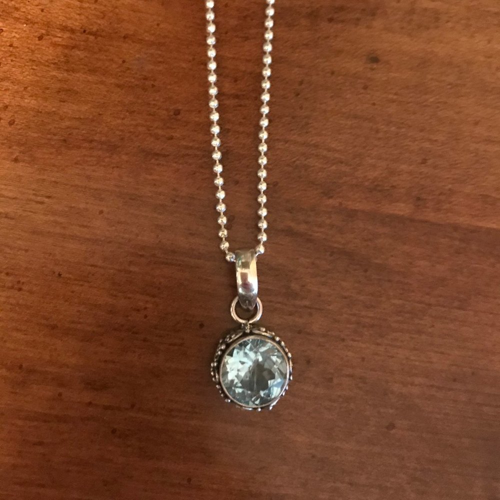 Handmade blue topaz pendant